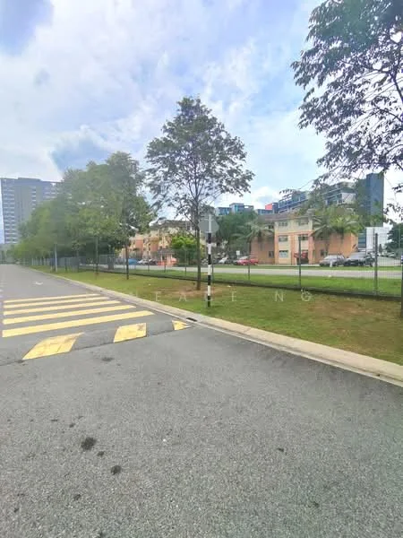 Exterior features: manicured lawn, mature trees, fenced perimeter, paved road, zebra crossing, urban setting, mixed-use buildings in background; style: modern.