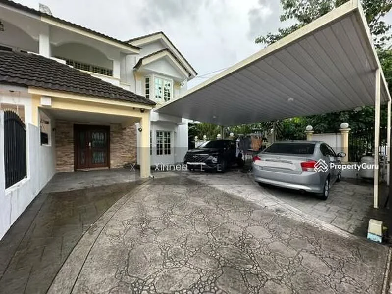 Exterior type: semi-detached house; features: car porch with awning, paved driveway, manicured landscaping, two parked cars, white painted facade, stone cladding accents, gated entry, front garden area; style: modern.