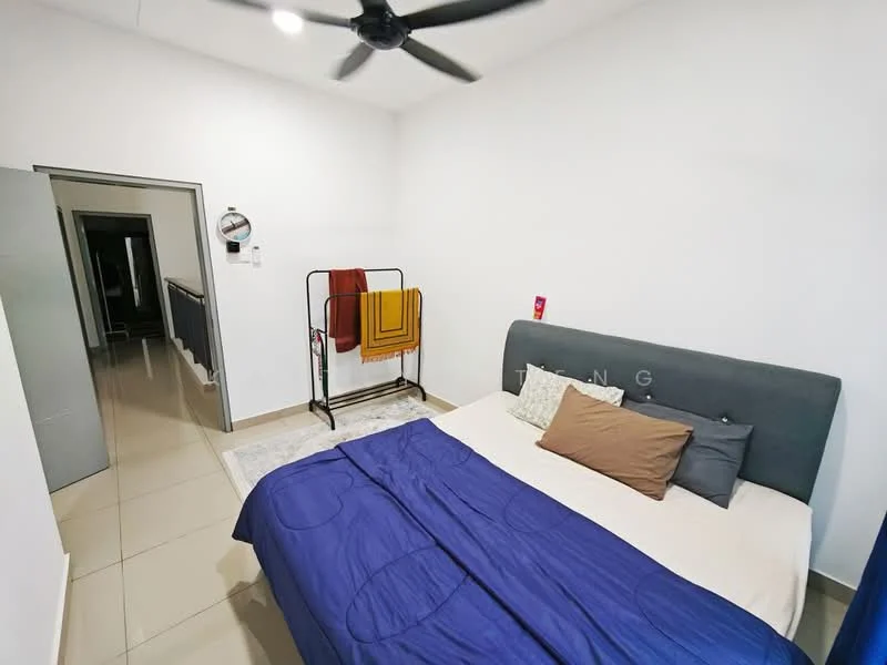 Bedroom features: queen-size bed, upholstered headboard, blue bedspread, decorative pillows, wall-mounted clock, floor-to-ceiling mirror, sliding door, ceiling fan, tile flooring, white painted walls, clothes rack with towels, area rug; style: modern.