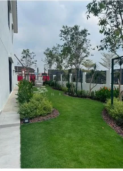 Exterior features: manicured lawn, landscaped garden with shrubs, decorative stone pathway, fenced perimeter, trees for shade, outdoor seating area, garden trellis, flower beds; style: modern.