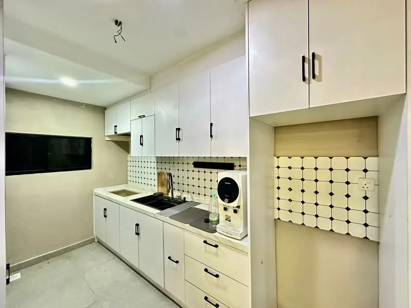 Kitchen features: white cabinetry with black handles, black countertop, single-bowl stainless-steel sink, chrome pull-down faucet, built-in stove, wall-mounted kitchen hood, white tiled backsplash with black pattern, grey tile flooring, window above sink, under-cabinet lighting; style: modern.