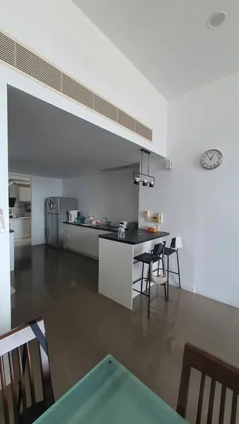 Kitchen features: white cabinetry, black countertop, stainless-steel fridge, built-in oven, 4-burner gas hob, pendant lighting, bar stools, clock on wall, open layout, tile flooring, high ceiling, wall-mounted cabinets; style: modern.