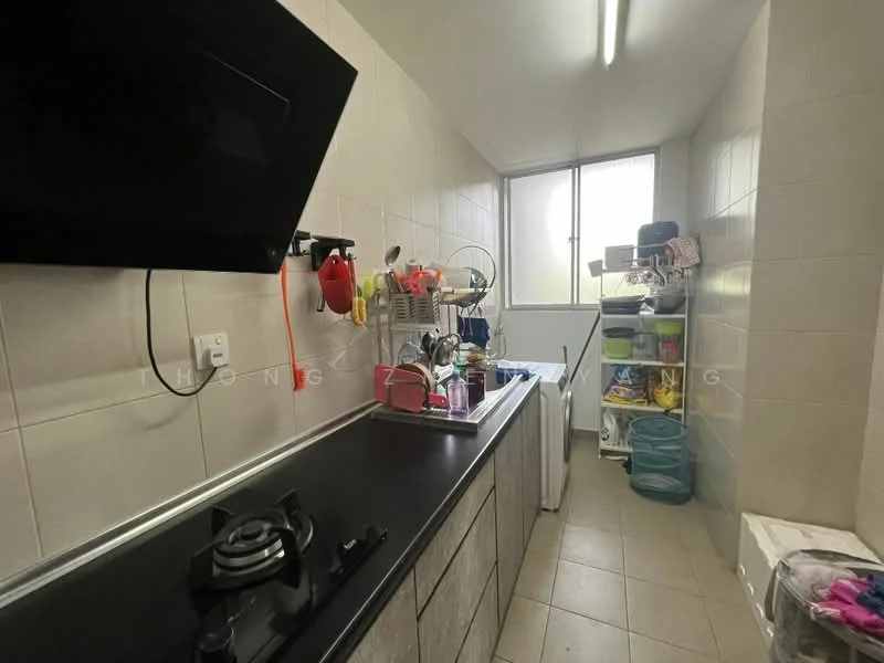 Kitchen features: black countertop, stainless-steel gas hob, wall-mounted TV, white tiled walls, light-colored cabinetry, sink with drying rack, window for natural light, storage shelves, floor tiles, kitchen utensils on countertop; style: modern.