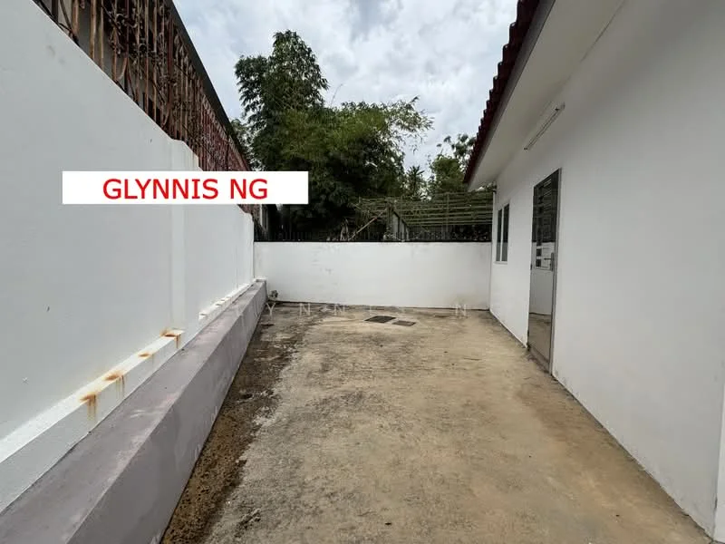 Exterior features: concrete flooring, white painted walls, fenced perimeter, roof overhang, landscaped area with trees, open space, drainage system visible; style: modern.