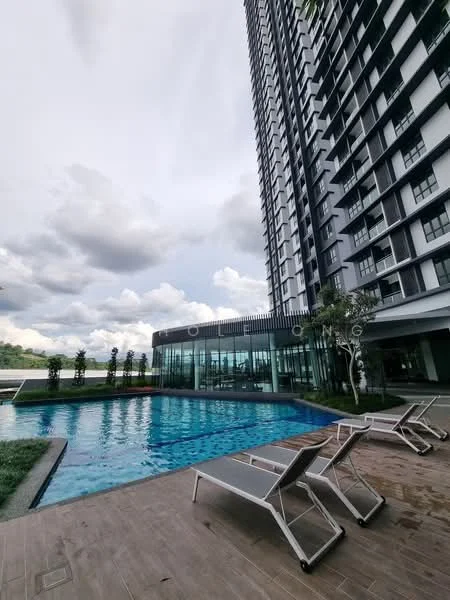 Exterior type: high-rise condominium; features: infinity pool, pool deck with loungers, glass curtain wall facade, green landscaping, surrounded by greenery, multiple storeys, outdoor seating area; style: modern.