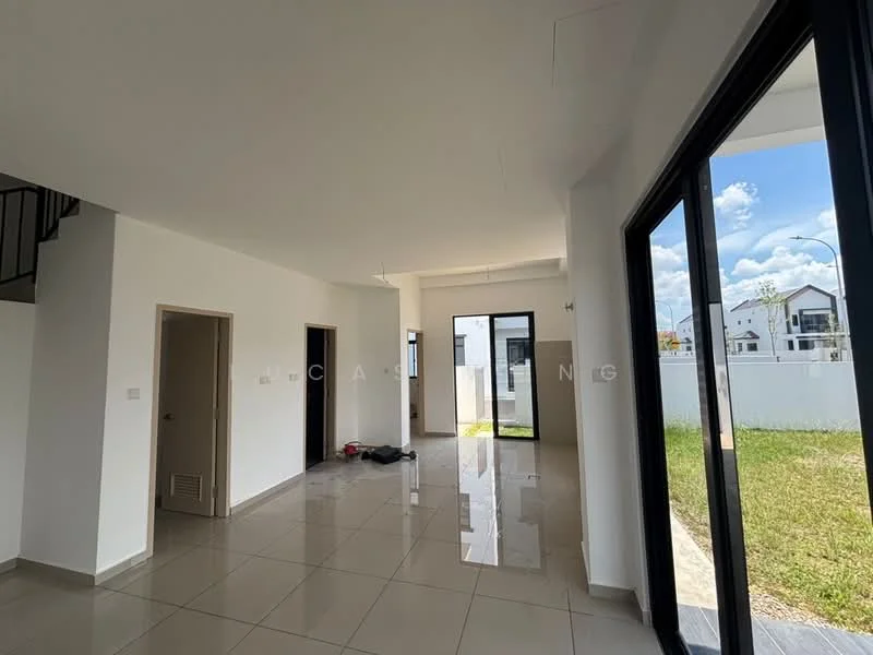 Room features: white painted walls, glossy ceramic tile flooring, large floor-to-ceiling windows, sliding glass door, high ceiling, staircase visible in background, natural light from windows, open layout; style: modern; view: garden.