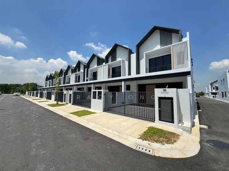 Exterior type: linked terrace house; features: white painted facade, flat roof, 2-storey, recessed balconies, manicured lawn, paved walkway, driveway with interlocking pavers, security gate, modern architectural design, surrounded by greenery; style: modern.