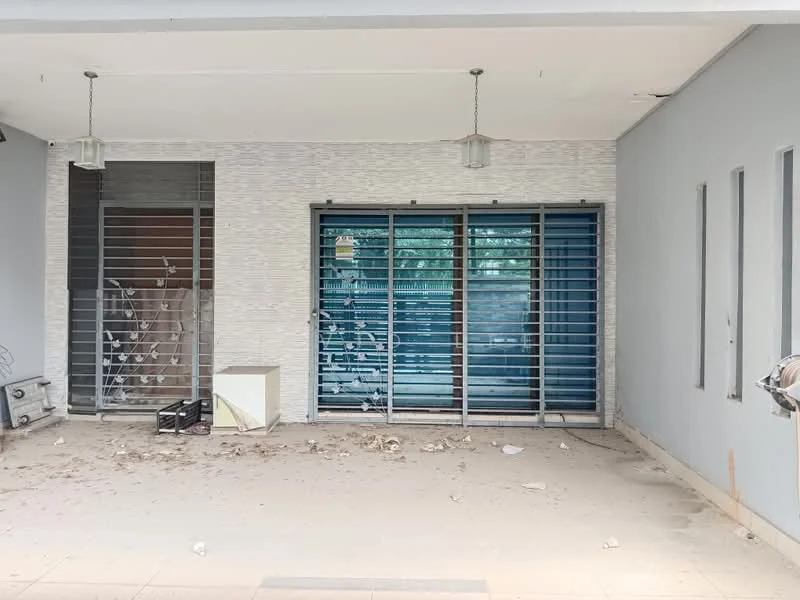Exterior features: grey painted walls, sliding glass doors with blue shutters, two pendant lights, concrete flooring, debris on the floor, exterior wall with textured finish; style: modern.