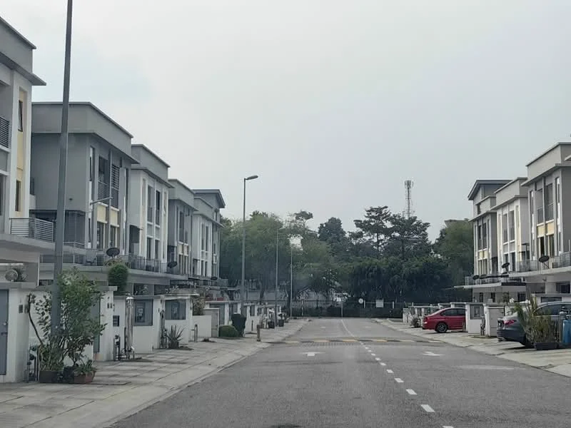 Exterior type: linked terrace house; features: two-storey linked terrace houses, grey painted facade, balconies on upper floors, manicured landscaping, paved driveway, street lighting, visible parking spaces, surrounded by greenery; style: modern.