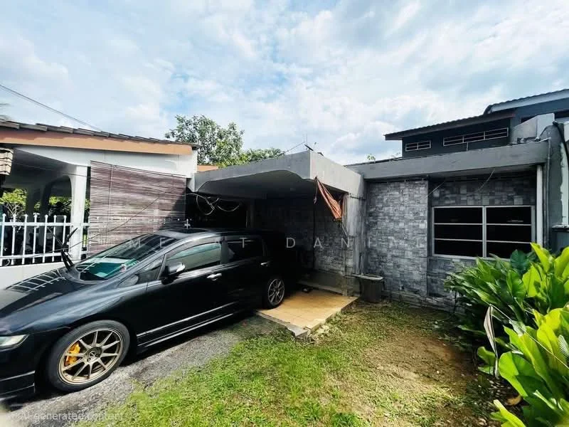 Exterior type: semi-detached house; features: grey stone cladding, flat roof, car porch with wooden decking, black sedan parked, manicured lawn, surrounded by greenery, single-storey, large windows, perimeter fence; style: modern.