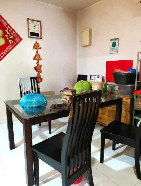 Dining features: black dining table, 4 black dining chairs, white tiled flooring, light beige painted walls, wall clock, decorative wall art, wooden sideboard, various kitchen items on the table.