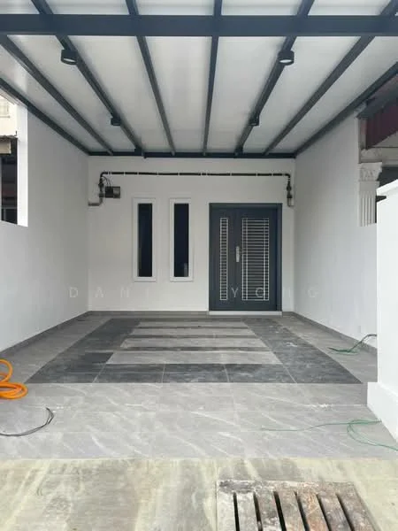 Exterior features: white painted walls, grey tiled flooring, metal roof with beams, vertical louvered door, narrow vertical windows, exposed electrical wiring, drainage grate, garden hose, concrete base, open space; style: modern.