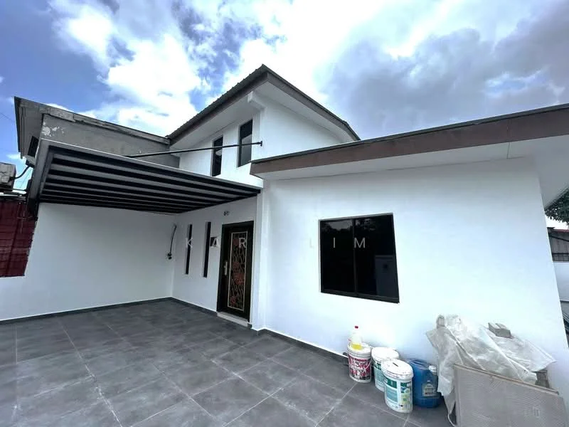 Exterior type: detached bungalow; features: white painted facade, flat roof, grey tiled flooring, large windows, covered porch with awning, manicured landscaping, exterior wall with decorative elements; style: modern.