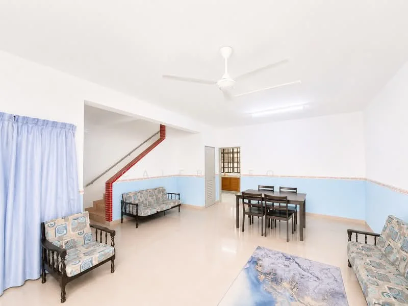 Living features: cream painted walls, blue accent wall, polished floor tiles, 5-blade ceiling fan with light, two 2-seater fabric sofas with patterned upholstery, dining table with 6 chairs, area rug with abstract pattern, curtains in light blue, staircase visible in background; style: modern.
