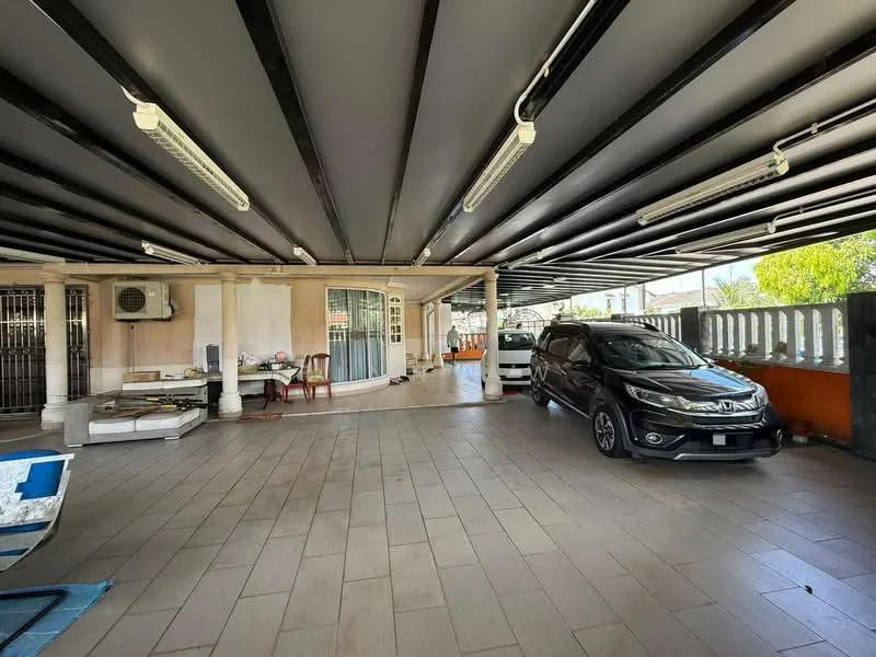 Exterior type: car porch; features: covered parking area, grey tiled flooring, exposed beams on ceiling, multiple ceiling lights, open layout, surrounded by walls, space for multiple vehicles, access to garden area, windows for natural light; style: modern.