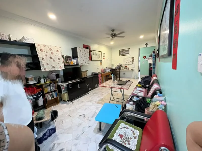 Living features: light blue painted walls, marble tile flooring, 5-blade ceiling fan, wall-mounted TV, black TV console, wooden shelving unit, dining table with chairs, decorative wall art, multiple chairs, window with floral curtains.