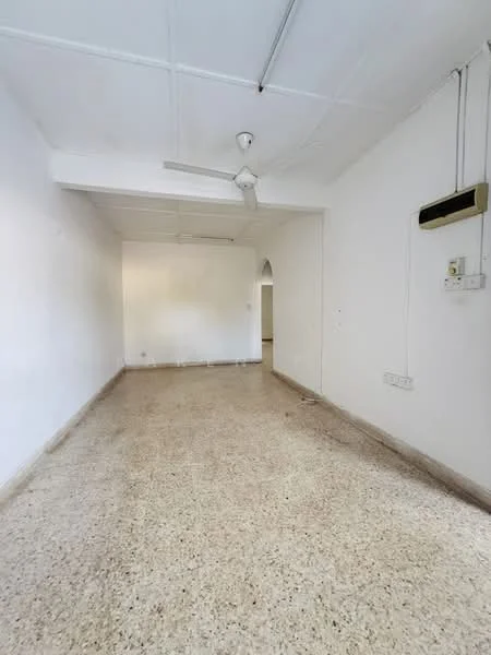 Room features: white painted walls, ceiling fan, light-colored terrazzo flooring, no visible furniture, single ceiling light fixture, air conditioning unit on wall, open layout, neutral color scheme; style: minimalist.