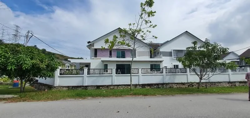 Exterior type: semi-detached house; features: white painted facade, two-storey structure, recessed balconies, manicured lawn, mature trees, fenced yard, paved walkway, surrounded by greenery; style: modern.