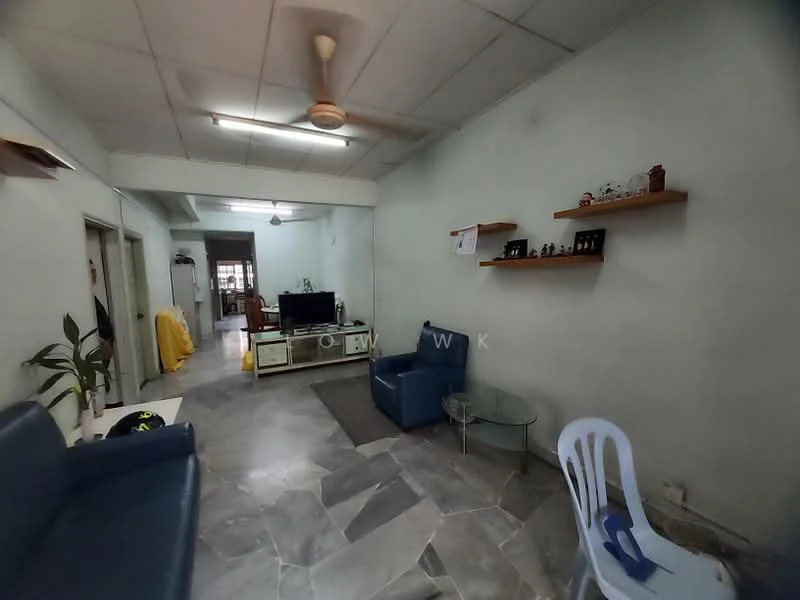 Living features: grey marble flooring, white painted walls, ceiling fan, wall-mounted TV, blue leather sofa, glass coffee table, wooden shelf with decor, area rug, plant in ceramic pot.