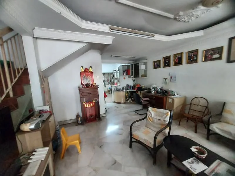 Living features: marble flooring, white painted walls, tray ceiling, recessed downlights, wooden staircase, wooden coffee table, 2-seater fabric sofa, armchair, decorative wall art, built-in cabinetry, kitchenette area visible, open layout, small yellow plastic chair; style: modern.