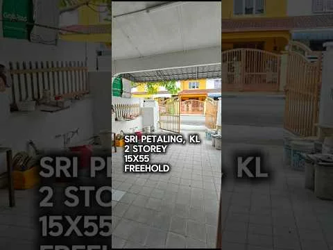 Exterior type: linked terrace house; features: paved driveway, fenced front yard, covered car porch, single-storey facade, yellow painted facade, front gate, manicured lawn, street view, two-storey structure, visible neighboring houses; style: modern.
