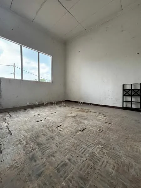 Room features: bare concrete flooring, white painted walls, large window with natural light, no visible furnishings, high ceiling, exposed ceiling, minimal decor; style: minimalist; view: street.