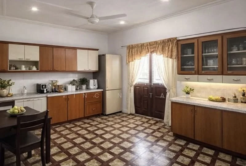 Kitchen features: brown wooden cabinetry, white countertop, stainless-steel fridge, built-in microwave, ceramic tile flooring with patterned design, ceiling fan, window with sheer curtains, double-bowl stainless-steel sink, chrome pull-down faucet, dining table with four chairs, decorative plants on countertop, glass-front upper cabinets; style: traditional.