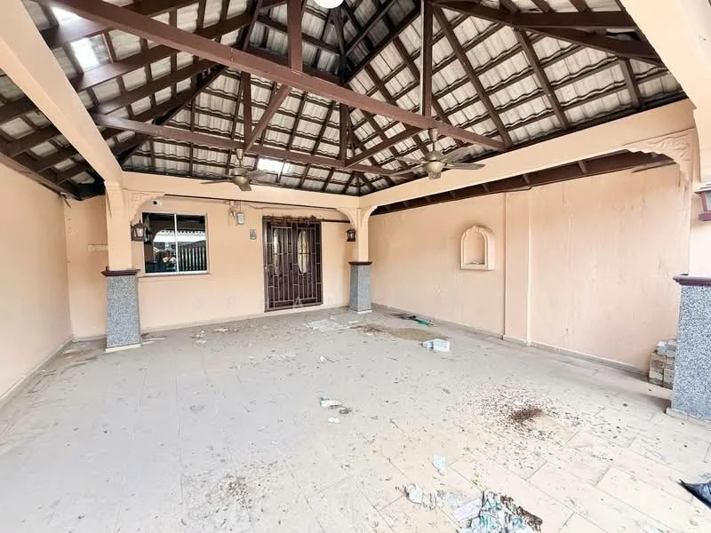 Room features: exposed wooden beams, metal roof, cream painted walls, tile flooring, 2 ceiling fans, decorative wall niches, double-door entrance, open layout, debris on floor; style: traditional.