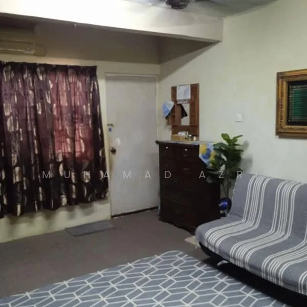 Room features: brown wooden door, striped fabric sofa, dark wooden dresser, brown curtains with floral pattern, grey area rug with geometric pattern, cream painted walls, air conditioning unit, wall-mounted artwork.