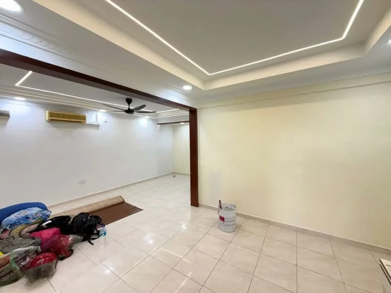 Living features: white painted walls, tray ceiling with recessed lighting, cream tiled flooring, 5-blade ceiling fan, 1 wall-mounted split AC, decorative wooden beam, empty space for furniture, roll-up mat on floor, paint bucket on floor; style: modern.