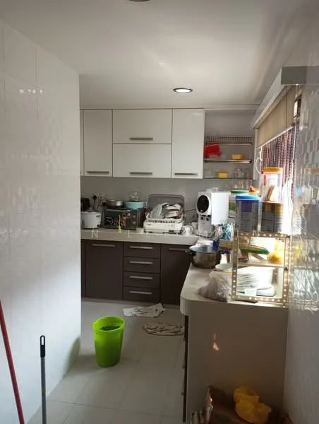 Kitchen features: white upper cabinets, brown lower cabinets, countertop with integrated sink, single-bowl stainless-steel sink, chrome pull-down faucet, built-in oven, dishwasher, microwave, ceramic tile flooring, recessed downlights, window with roller blinds, open shelving, green bucket, dirty dishes on countertop; style: modern.