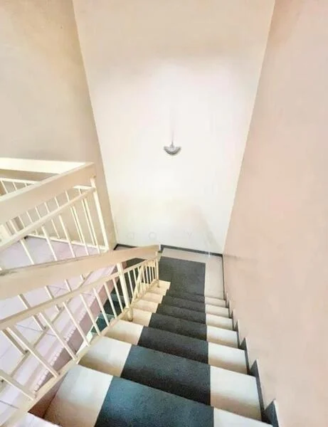 Room features: staircase with white railing, black and white tiled flooring, plain white walls, ceiling light fixture; style: modern.