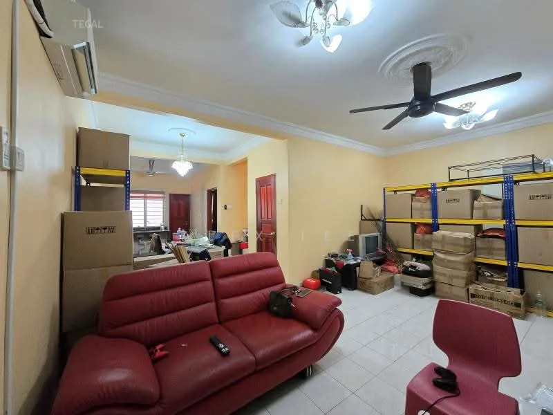 Living features: red leather sofa, ceiling fan, recessed ceiling lights, wall-mounted air conditioning unit, light-colored tiled flooring, yellow painted walls, shelving unit with boxes, decorative chandelier, TV console, remote control on sofa, plastic chair.