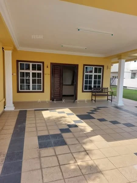 Exterior type: detached bungalow; features: yellow painted facade, white columns, tiled flooring with black and beige tiles, double-door wooden entrance, two windows with white frames, bench seating, manicured lawn, covered porch area; style: modern.
