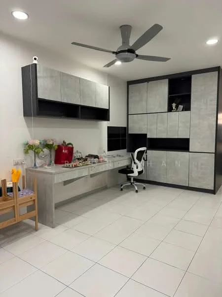 Study features: white tiled flooring, grey wall-mounted cabinets, black and grey built-in storage unit, desk with grey surface, white ergonomic office chair, ceiling fan, decorative flowers on desk, wall-mounted camera, shelves with decorative items; style: modern.