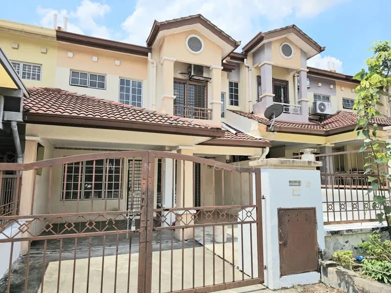 Exterior type: linked terrace house; features: two-storey building, red tiled roof, cream painted facade, balconies on upper floor, metal gate at entrance, gravel driveway, air conditioning units visible, windows with grilles, front porch area, garden space in front; style: modern.