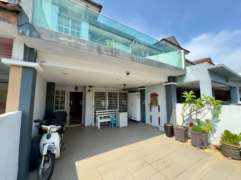 Exterior type: linked terrace house; features: balcony with glass railing, tiled flooring, white painted facade, motorbike parked, outdoor seating area, potted plants, covered porch, exterior wall with blue paint, window with white grille, main entrance door, decorative wall feature; style: modern.