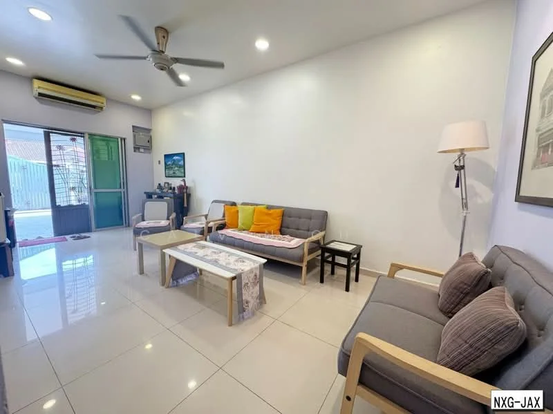 Living features: grey fabric 3-seater sofa, light wood armchair, white coffee table, decorative throw pillows in orange, wall-mounted air conditioning unit, ceiling fan, white painted walls, glossy tile flooring, floor-to-ceiling glass door, natural light from outside, lamp with white shade, framed artwork on wall; style: modern; view: garden.