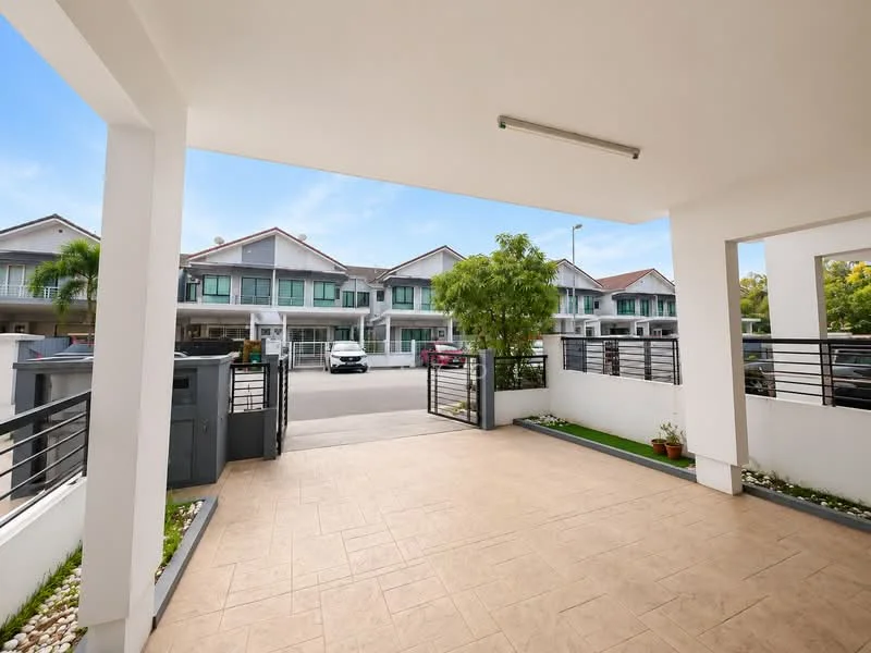 Exterior type: linked terrace house; features: paved driveway, manicured lawn, landscaped garden with plants, metal railing, outdoor lighting, front porch area, two-storey houses in background, parking spaces visible, clear blue sky; style: modern.