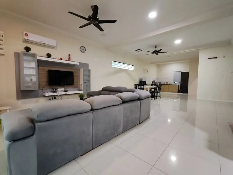 Living features: grey fabric sectional sofa, wall-mounted TV, TV console with storage, white painted walls, recessed downlights, 2 ceiling fans, large windows with natural light, glossy ceramic tile flooring, decorative wall clock, open layout to dining area; style: modern.