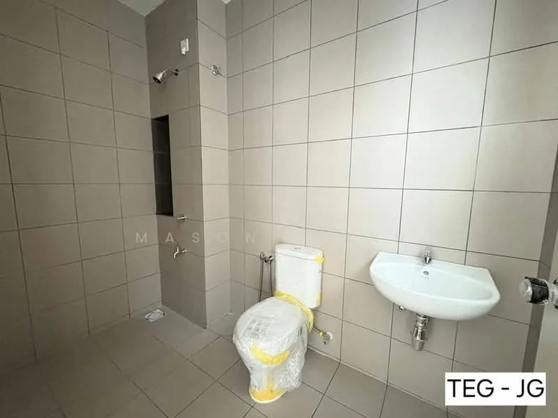 Bathroom features: grey tiled walls, grey tiled flooring, single-sink vanity with wall-mounted faucet, one-piece toilet, shower area with wall-mounted shower head, glass shower enclosure, towel rail, exposed plumbing, no visible storage, neutral color scheme; style: modern.