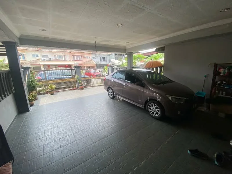 Exterior type: linked terrace house; features: paved driveway, covered car porch, grey tiled flooring, exposed concrete walls, manicured lawn, fence with gate, outdoor lighting, surrounding residential area; style: modern.