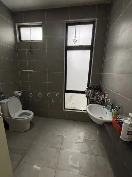 Bathroom features: grey tiled walls, light grey tiled flooring, one-piece toilet, wall-mounted sink, single basin, window for natural light, shower area, mirror above sink, toiletries on countertop; style: modern.