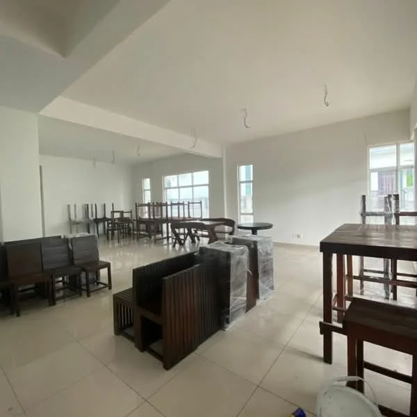Room features: white painted walls, tile flooring, large windows, wooden furniture, multiple dining tables, wooden chairs, unfurnished space, ceiling with hanging lights; style: modern.