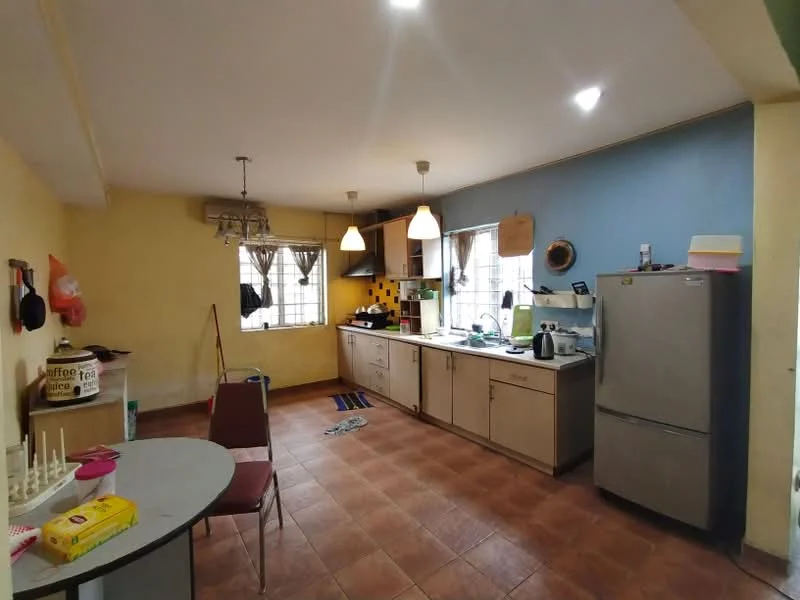 Kitchen features: yellow painted walls, blue accent wall, tile flooring, ceiling lights, hanging pendant lights, double-bowl stainless-steel sink, chrome pull-down faucet, kitchen cabinetry with flat-panel doors, built-in oven, freestanding fridge, window treatments with sheer curtains, table with round top, four dining chairs; style: modern.