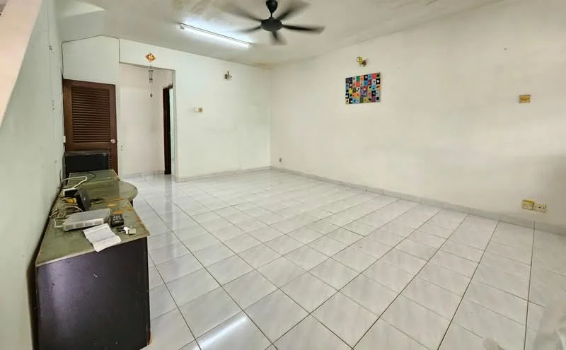 Living features: white painted walls, glossy white tile flooring, 5-blade ceiling fan, wall-mounted light fixtures, empty space, no visible furniture, single door leading to another room, decorative wall art, power outlets visible.