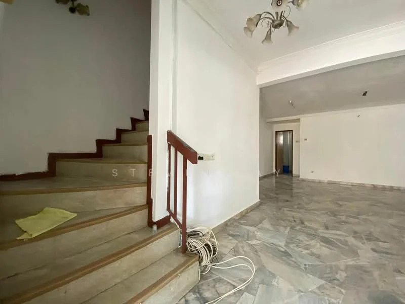 Room features: marble flooring, white painted walls, staircase with wooden railing, ceiling light fixture, open layout, visible electrical outlets, neutral color scheme, natural light from windows; style: modern.