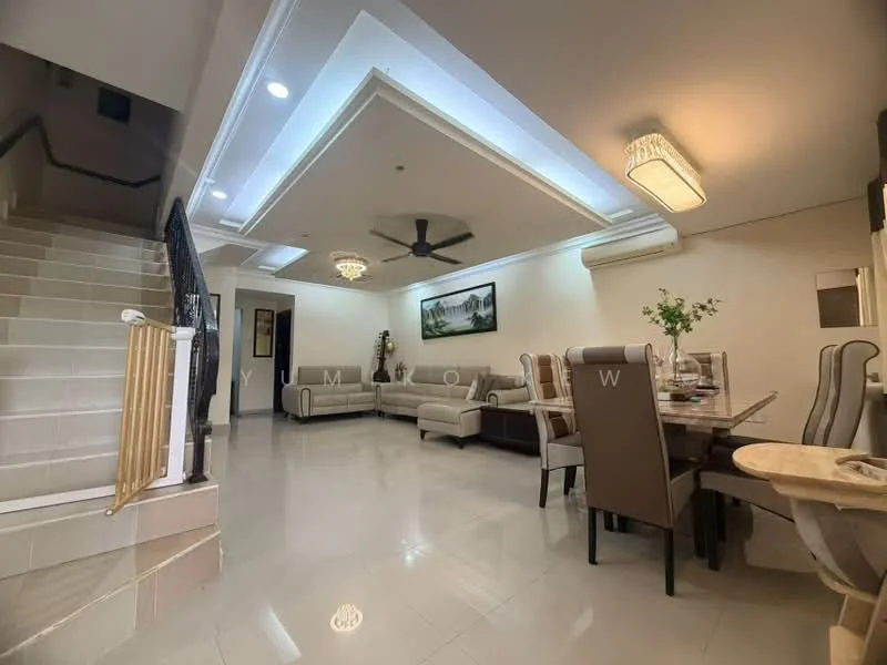 Living features: cream painted walls, tray ceiling with recessed lighting, 5-blade ceiling fan with light, large wall-mounted artwork, marble tile flooring, sofa set in light grey, coffee table, area rug, dining table with upholstered chairs, decorative vase with flowers, wall-mounted light fixture; style: modern. Room features: staircase with wooden railing, white painted walls, natural light from windows.
