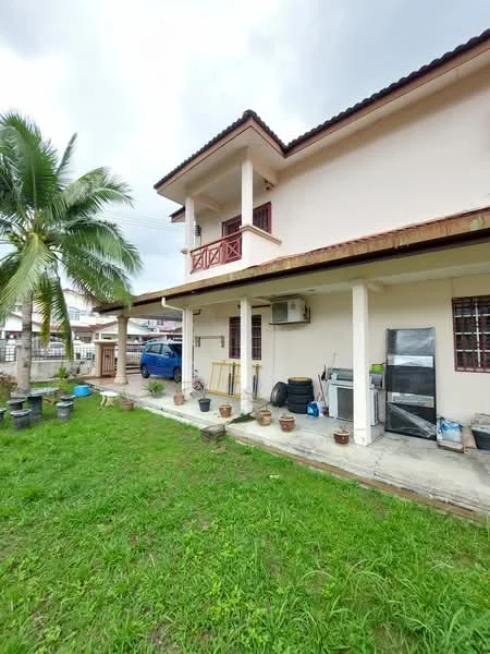 Exterior type: detached bungalow; features: two-storey building, cream painted facade, balcony with wooden railing, palm tree in garden, manicured lawn, concrete patio, visible air conditioning unit, multiple flower pots, car parked in driveway, sliding glass door, windows with security bars; style: modern.