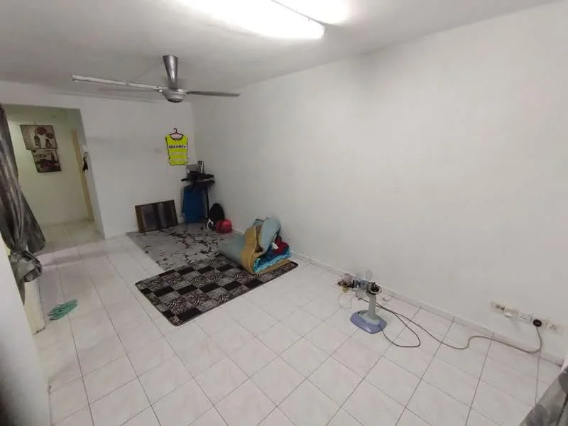 Room features: white painted walls, white tiled flooring, ceiling fan, area rug with geometric pattern, exercise ball, folded blanket, floor fan, visible electrical outlets.
